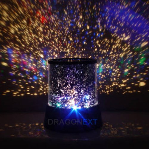 Glow in the dark plastic stars are cool, but this is way cooler! Star Master Colorful Starry Night Cosmos Projector Bed Side Lamp