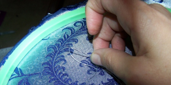 Tie off thread.