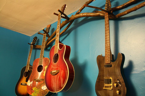 Hand-made, up-cycled, tree branch guitar rack • Offbeat Home & Life