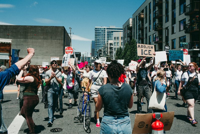 These photos of moms & babes nursing in protest of family separation will hit you right in the FEELS