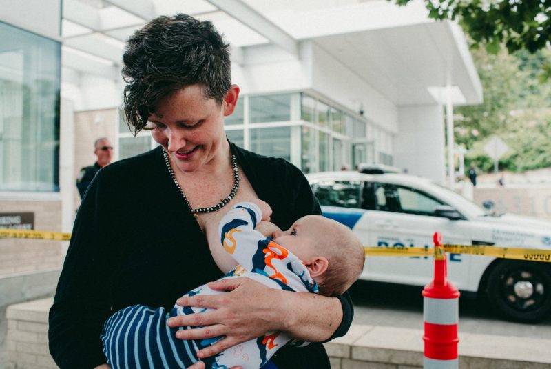 These photos of moms & babes nursing in protest of family separation will hit you right in the FEELS