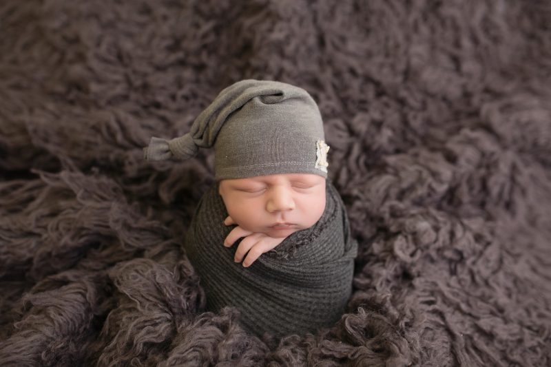 Try not to squee too loudly when you see this newborn dressed up as a baby bear