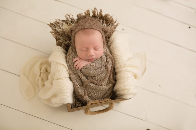 Try not to squee too loudly when you see this newborn dressed up as a baby bear