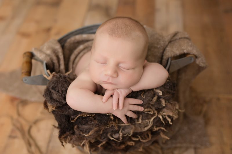 Try not to squee too loudly when you see this newborn dressed up as a baby bear